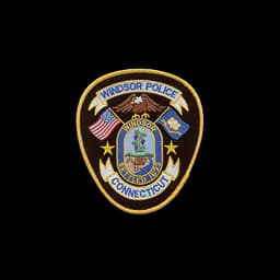 Official badge of Windsor Police Department, the shelter’s public operator